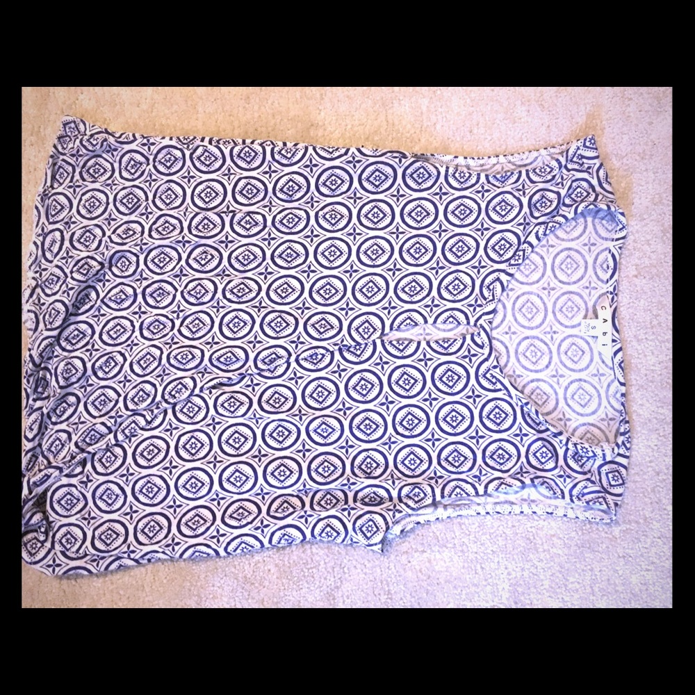 Tank with peekaboo and gathered hem.